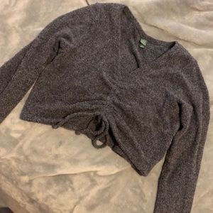 Grey super soft crop top. Adjustable ties for desired length and tightness.